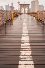 Brooklyn Bridge with no people on a rainy day