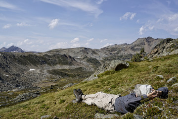 Hiker relaxing in Canadian Rockies