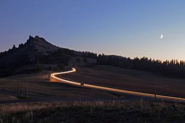 moon over mtn w car light streaks