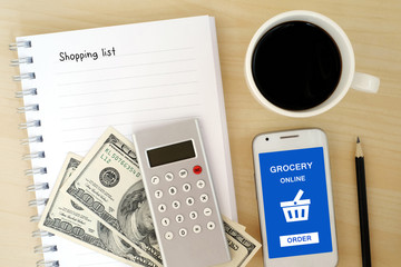 Smart phone with grocery online on screen and shopping list
