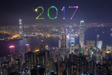 Obraz premium 2017 Happy New Year Fireworks celebrating over Hong Kong city