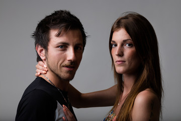 woman holding her man with her hand