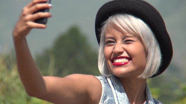 Young Woman Posing For Selfies