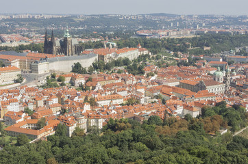 Fototapeta na wymiar Prague is the capital of the Czech Republic. Political and cultural center of Bohemia. Historic center included in the Unesco World Heritage. Landscape from Petrin Tower to the castle.