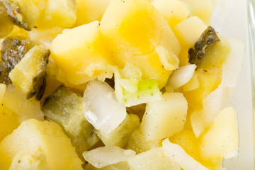 Potato salad with cucumber and onions.
