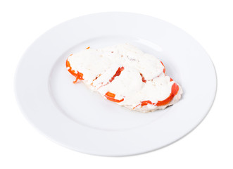 Chicken fillet covered with soft cream.