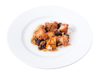 Traditional baked pork with dried plums.