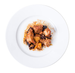 Traditional baked pork with dried plums.
