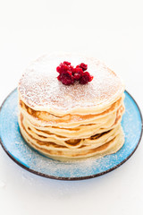 Pancake with sugar and berries