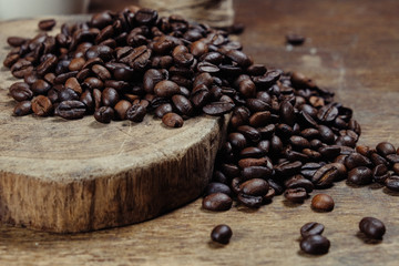 Coffee Bean on wood background with filter effect retro vintage
