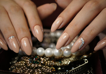 Awesome nails and beautiful clean manicure. Nails are natural. Manicure is made using nails drill machine.