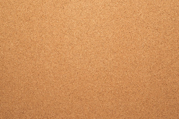 Fototapeta na wymiar Brown cork board texture. Close up.