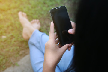 Woman using smartphone.