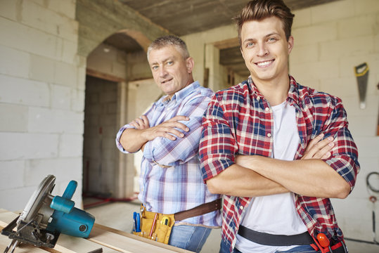 Two Of Carpenters Posing To The Camera