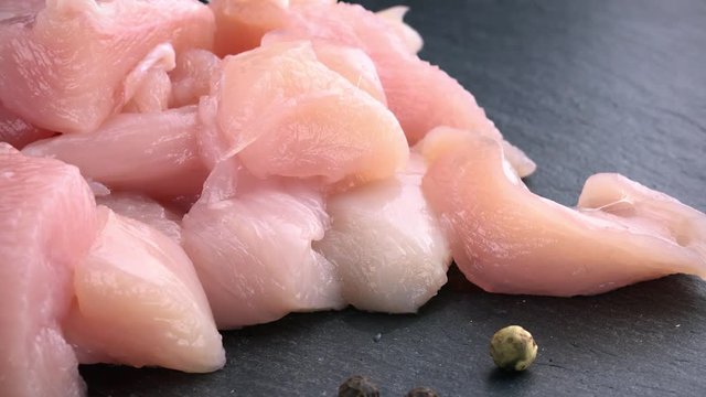 Rotating chopped Chicken Fillet (seamless loopable; 4K clip)