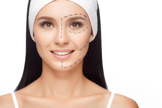 Woman with perforation lines on her face