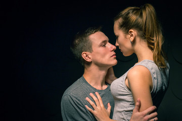 Passionate young couple in the room