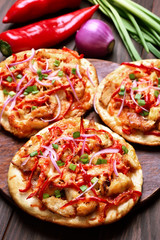 Pizza with chicken meat and vegetables