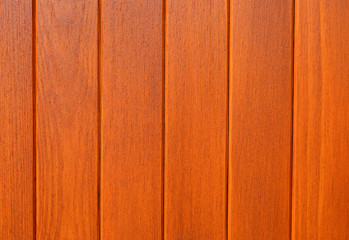 Wood texture. Lining boards wall. Wooden background pattern. Showing growth rings. orange color