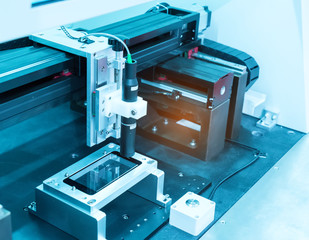 Industrial robot working in phone factory