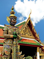 Fototapeta na wymiar Thai style giant statue at Temple of Emerald Buddha (Wat Phra Kaew) in Grand Royal Palace,Thailand