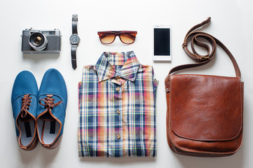 Outfit of traveler, student, teenager. Overhead of essentials for modern young person. Different...