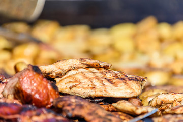 Sausages And Steaks On Barbecue Grill