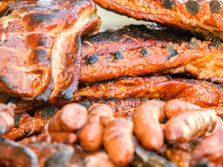 Sausages And Steaks On Barbecue Grill