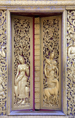 golden apsara bas-relief
