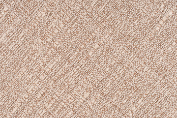 Fototapeta na wymiar close up of a woolen fabric of beige color.