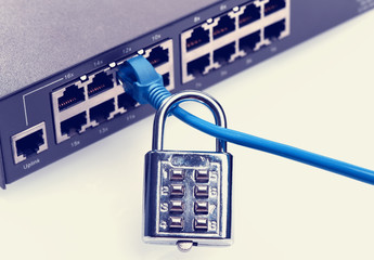 network and data protection concept with padlock and switch
