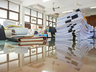 Business Concept, Pile of unfinished documents on office desk, Stack of business paper