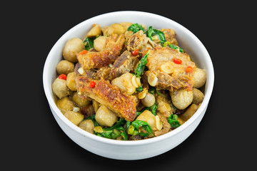 Spicy fried crispy pork with basil leaves