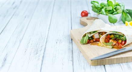 Chicken Wraps on a wooden table