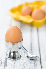 Wooden table with boiled Eggs