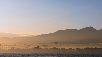 Mountain in yellow fog