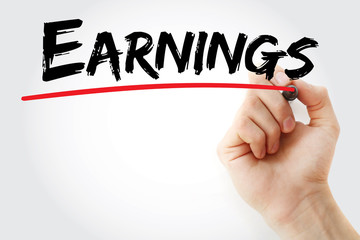 Hand writing Earnings with marker, concept background