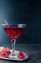 pomegranate cocktail and ripe red  fruit