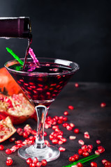 Pouring drink into a glass