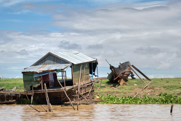 Boat houses and homes on stilts along Tonle Sap Lake in Kampong Khleang, Cambodia