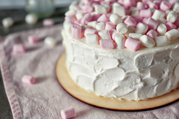 Delicious cake with marshmallows, close up