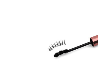 Mascara and fake eye lash isolated on white background with copy space.