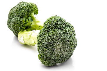 Fresh broccoli on white background. Selective Focus.