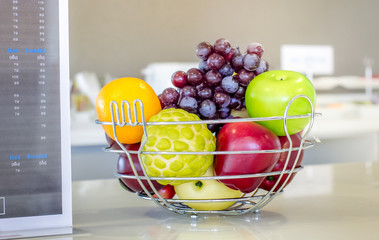 Fresh fruit  on kitchen table in breakast.