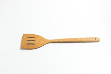 Wooden flipper or spade isolated on white background