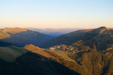 Obraz premium Sunrise over Bolognola village