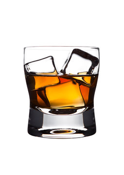 Glasss of whiskey with ice cubes isolated