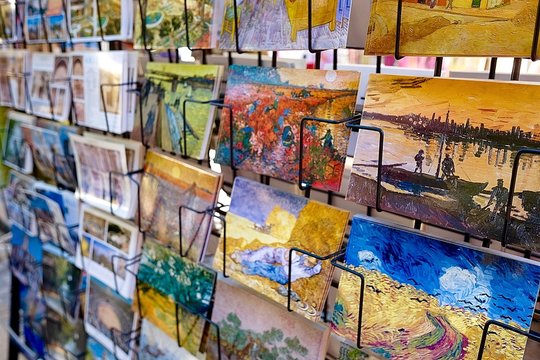 Postcards in a shop. Postcards of Van Gogh paintings in a shop, Arles, France
