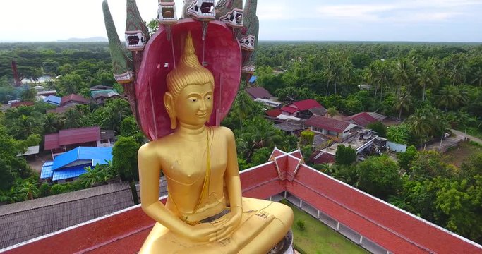 Aerial Shot of Buddha Statue with Nagas Over Head, Songkhla, Thailand