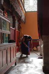 monk mopping temple floor